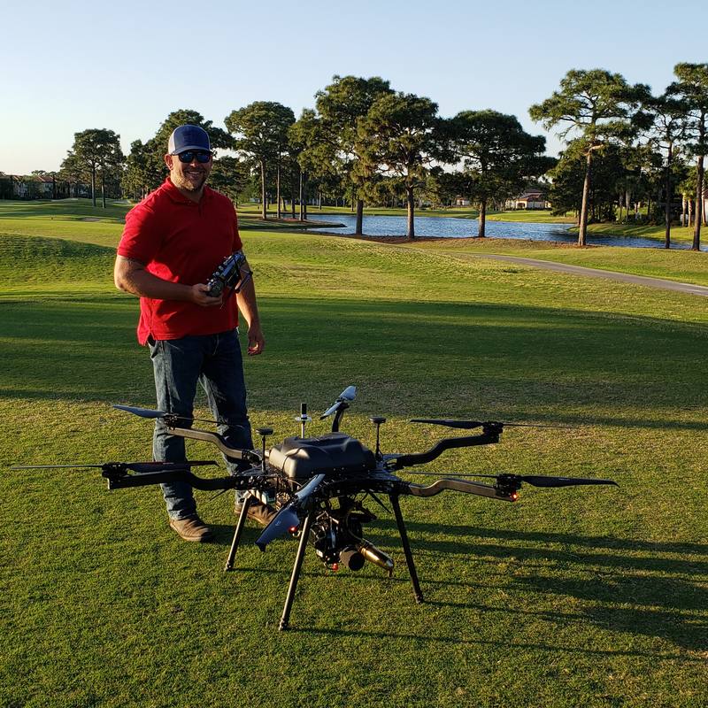 James O'Donoghue with a survey aircraft on a coastal property