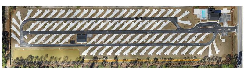 High resolution orthomosaic of a paved parking and drive area