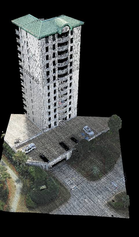 Colorized LiDAR point cloud of a coastal condominium tower and its site